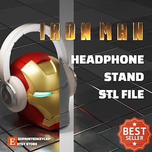 Könnte beinhalten: Ein 3D-gedruckter Kopfhörerständer mit einem roten, goldenen und silbernen Iron-Man-Design. Der Ständer ist so konzipiert, dass er Kopfhörer mit einem Kopfbügel aufnehmen kann. Das Bild enthält den Text "IRON MAN HEADPHONE STAND STL FILE" und "BEST SELLER".