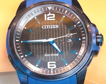 "Citizen Herren Eco-Drive Blue & Black Weekender Uhr."