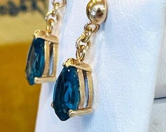 Orecchini Syna in oro giallo con diamanti e topazio blu in vendita su Italia