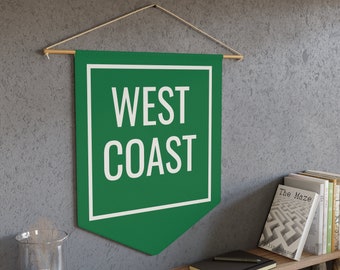 May include: Green pennant banner with a white border and white text that reads "WEST COAST".