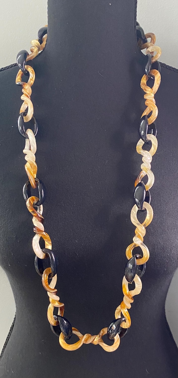 Long Continuous Strand of Resin Twisted and Paper… - image 1