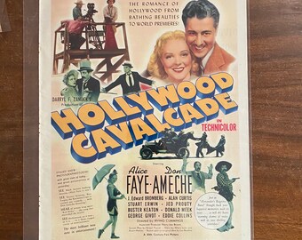 May include: A vintage movie poster for the film "Hollywood Cavalcade" starring Alice Faye and Don Ameche. The poster features a colorful image of the two actors, along with the film's title in large, bold letters. The poster also includes the tagline "The Romance of Hollywood from Bathing Beauties to World Premieres!" and the text "In Technicolor."