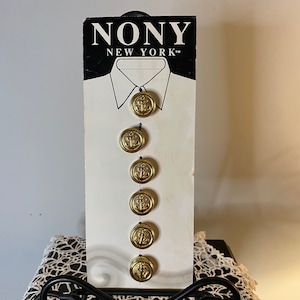NONY New York Gold Finish Anchor Button Covers on original display card
