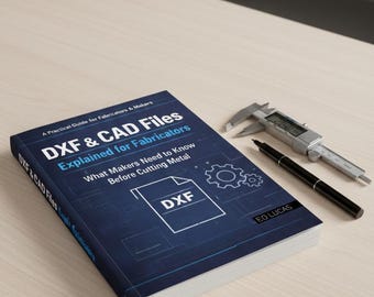 May include: A book titled "DXF & CAD Files Explained for Fabricators" with a blue cover, a digital caliper, and a black pen on a light wood surface. The book's cover features the text "What Makers Need to Know Before Cutting Metal."