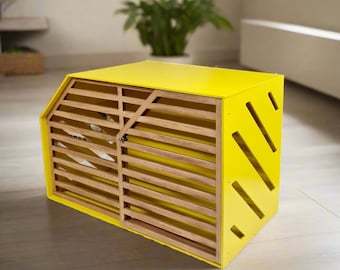 May include: A yellow wooden pet crate with a slatted door and a geometric pattern on the side.