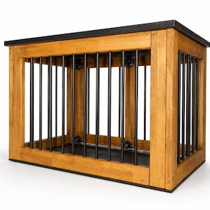 K&ouml;nnte beinhalten: Eine rechteckige Tierbox aus hellbraunem Holz mit dunkelbraunem Deckel und Boden. Die Konstruktion verf&uuml;gt &uuml;ber vertikale schwarze Metallst&auml;be an der Vorder- und den Seiten, die mit runden Metallbeschl&auml;gen an den Ecken befestigt sind.