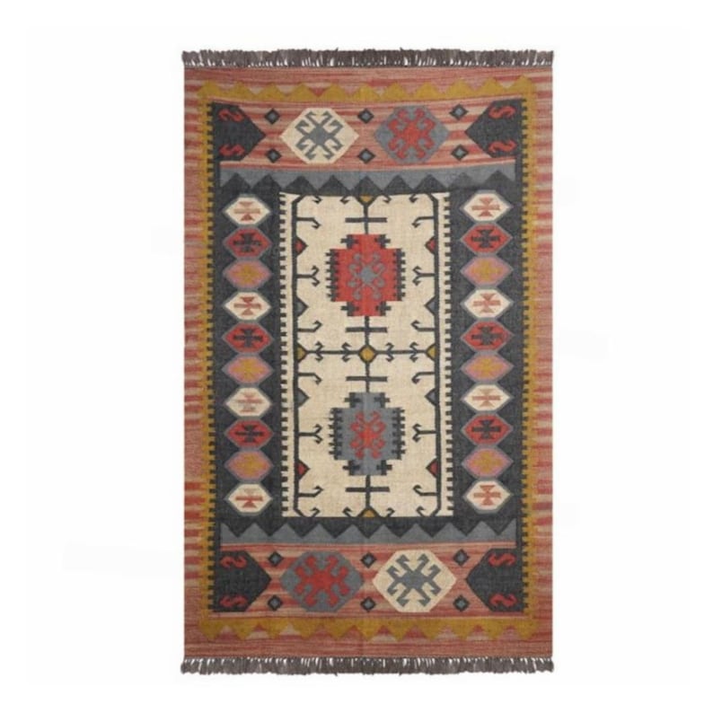 May include: A rectangular rug with a geometric pattern in shades of red, black, white, and gray. The rug has a fringe border.