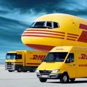 May include: A yellow DHL airplane, truck, and van are parked on a tarmac against a blue sky. The vehicles and plane have the DHL logo in red. The plane is in the background, with the truck and van in the foreground.