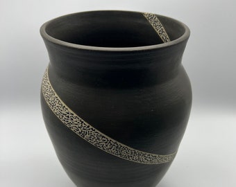 Ceramic vase with decorative hand-painted design
