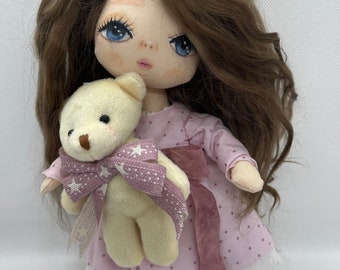Handmade doll with pink dress