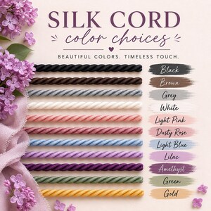 May include: An image showcasing silk cord color choices. The cords are displayed in various colors, including black, brown, grey, white, light pink, dusty rose, light blue, lilac, amethyst, green, and gold. Text reads "SILK CORD color choices."