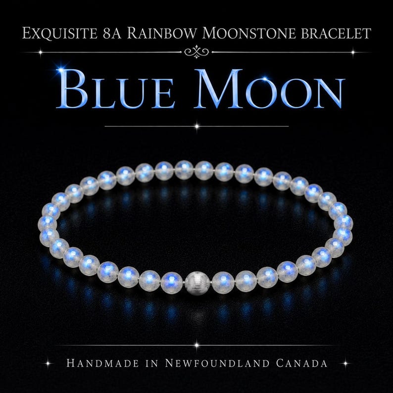 May include: A bracelet featuring round rainbow moonstone beads with a blue iridescent sheen, accented by a single textured silver-toned spherical bead. The text reads: EXQUISITE 8A RAINBOW MOONSTONE BRACELET, BLUE MOON, HANDMADE IN NEWFOUNDLAND CANADA.