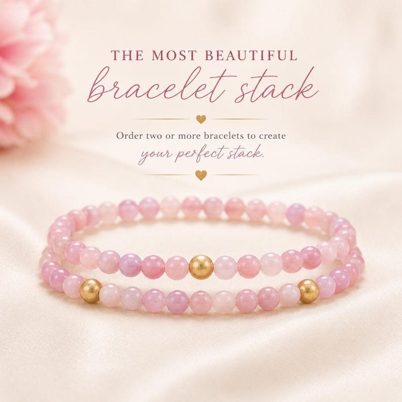 May include: Two beaded bracelets featuring light pink and lavender spherical beads. Each bracelet includes a single brushed gold-tone spherical bead. The text reads: THE MOST BEAUTIFUL bracelet stack. Order two or more bracelets to create your perfect stack.