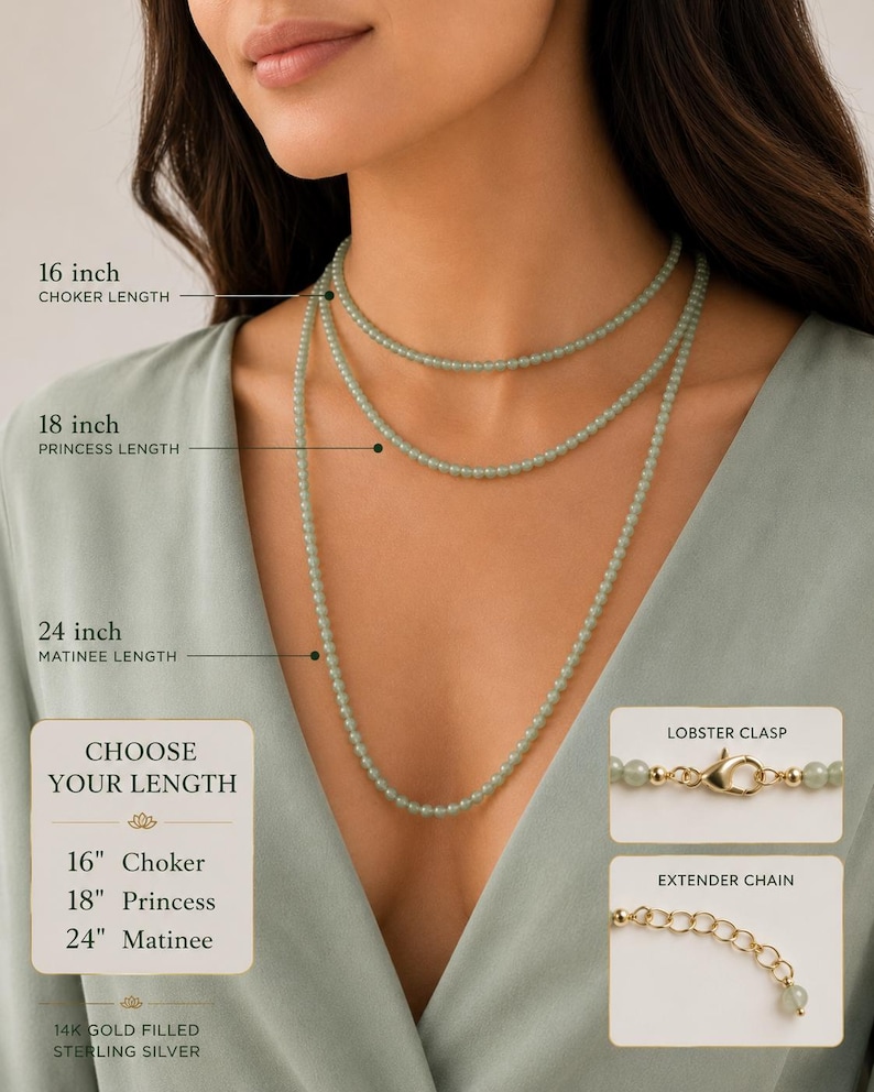 May include: A light green beaded necklace available in 16 inch choker, 18 inch princess, and 24 inch matinee lengths. The necklace features a gold-colored lobster clasp and an extender chain. Text indicates 14K gold filled and sterling silver.