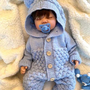 Hooded baby romper 3-6 months, hand-knit from baby-soft acrylic yarn.