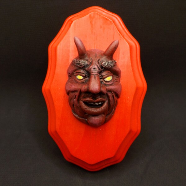 Mini Demon/Devil/Imp face mounted on wooden plaque. Unique art piece.