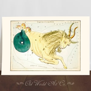 May include: A vintage illustration of the constellation Capricornus, depicted as a sea-goat with a fish tail. The illustration is in a light blue and white color scheme with gold accents. The constellation is surrounded by a grid of stars and labeled with the name "Capricornus" in a decorative font.