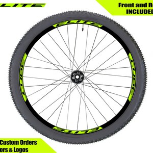May include: Black bicycle wheel rim with a neon green "ELITE" sticker on the side. Front and rear wheels are included.