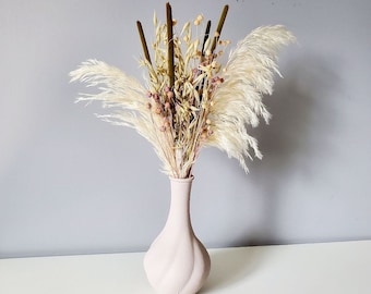 Dried and preserved flower arrangement