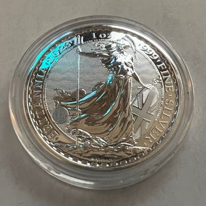 Moneda Britannia de plata de 1 onza de 2023, sin circular, en cápsula hermética.