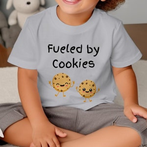 Toddler Fueled by Cookies T-Shirt, Cute Cookie Cartoon Graphic Tee, Funny Snack Lover Kids Shirt, Unisex Children's Apparel image 1
