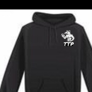 May include: Black hooded sweatshirt with a white graphic of a muscular cartoon animal lifting a dumbbell. The graphic also includes the text "TTP".