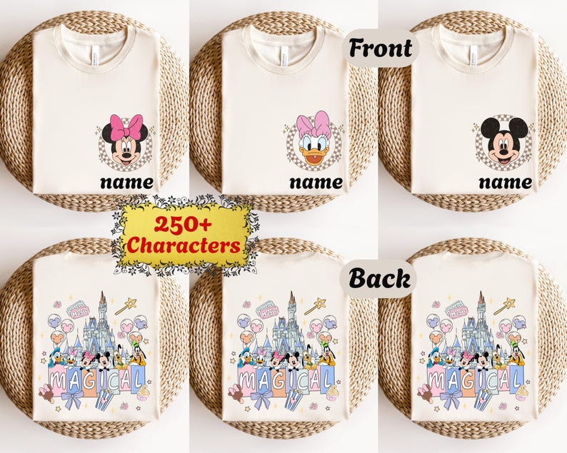 May include: Cream-colored t-shirts with cartoon character designs. The front of the shirts feature Minnie Mouse, Daisy Duck, and Mickey Mouse. The back of the shirts have a castle and the word "MAGICAL".