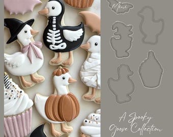 May include: A collection of Halloween-themed cookies, including goose-shaped cookies decorated as a skeleton, mummy, witch, and pumpkin. Also included are bat and cupcake cookies. The text "A Spooky Goose Collection" is visible.