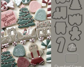 May include: Gingerbread Express Collection cookie cutters. The set includes a gingerbread house, candy cane, train, tree, and gingerbread man. The cutters are made of metal and are silver in color.