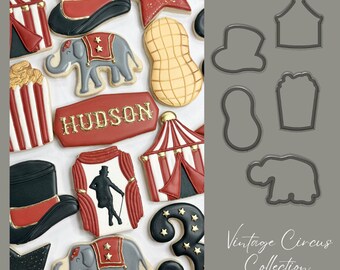 May include: Vintage circus cookie cutters in various shapes, including a tent, elephant, peanut, hat, popcorn bucket, and a star. The cutters are made of metal and have a silver finish. The text "Vintage Circus Collection" is printed on a white background.