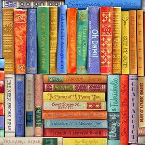 May include: A colorful bookshelf filled with books about sewing, crafting, and fabric. The books have titles like "Sewing Made Simple", "Fabricholic Anonymous", "The Secrets of a Sewing Diva", and "Diary of a Fabric Hoarder".