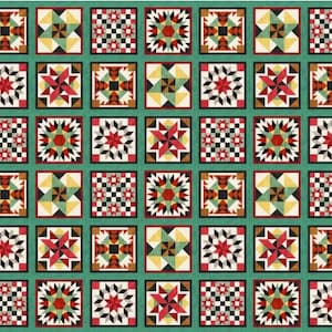 May include: A colorful quilt with a repeating pattern of square blocks. Each block features geometric designs in red, black, yellow, and green, set against a teal background. The quilt showcases a traditional patchwork design.