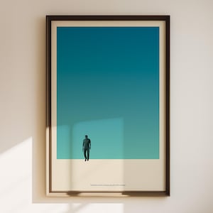 May include: A framed poster with a minimalist design featuring a single figure walking towards a blue and green gradient background. The text at the bottom reads "Sometimes in life's extremes, you get to be a stranger."