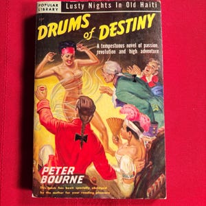 May include: A vintage paperback book cover with a colorful illustration of a woman dancing in a red dress and a man in a red jacket. The book title is "Drums of Destiny" and the author is Peter Bourne. The book is part of the "Popular Library" series.
