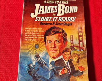 James Bond in Strike it Deadly, by Barbara & Scott Siegel, First Edition, Paperback Book, 1985