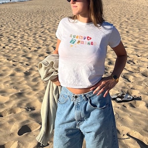 Magazine Cutout Graphic Baby Tee