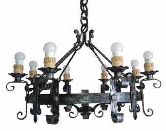 Wrought iron chandelier with 8 lights, forged and hammered art. 1211