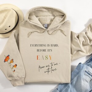 Everything Is Hard Before It&#39;s Easy Hoodie & Sweatshirt | Motivational Quote Apparel | Growth and Transformation | Monarch Butterfly Sleeve