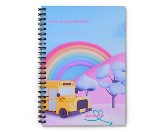 May include: Spiral-bound notebook with a colorful cover featuring a yellow school bus, rainbow, and text that reads "my notebook" and "grade". The background has a whimsical, pastel-colored landscape.