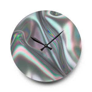 May include: Round wall clock with a holographic, iridescent design in shades of silver, pink, green, and blue. The clock face has a swirling, liquid-like pattern. Black clock hands indicate the time. The clock is a decorative home decor item.