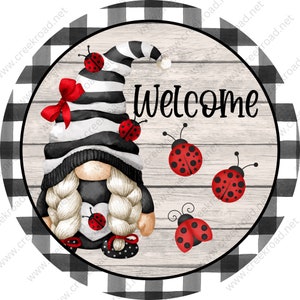 May include: A round decorative sign featuring a gnome with a black and white striped hat and a red bow. The gnome has a heart-shaped design with a ladybug. The word "Welcome" is written in black. Ladybugs are scattered around the gnome, set against a wood grain background.