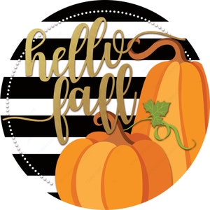 May include: A black and white striped circle with gold lettering that says "hello fall". Two orange pumpkins are in the bottom half of the circle.