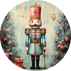 May include: A vintage-style Christmas nutcracker figurine with a blue uniform, red hat, and a mustache. The nutcracker is standing in front of a Christmas tree with ornaments and a red gift box.