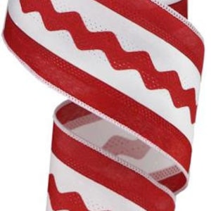 May include: Red and white striped ribbon with a zig-zag pattern. The ribbon is 2.5 inches wide and is made of a soft, textured fabric.