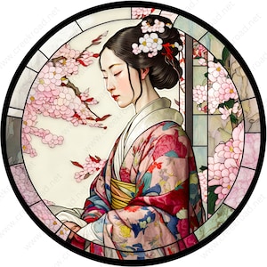 May include: A woman in a colorful kimono with a floral pattern stands in front of a stained glass window with pink blossoms. The woman has dark hair and is wearing a flower crown.