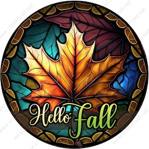 May include: A stained glass style illustration of a fall leaf with the text "Hello Fall" in a green font.