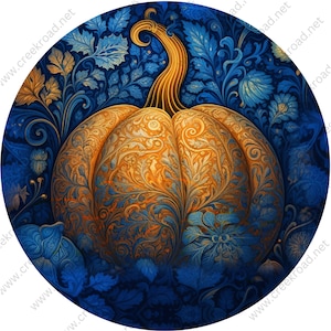 May include: A large, orange pumpkin with intricate gold and blue floral designs on its surface. The pumpkin is surrounded by a blue and gold floral pattern.