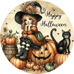 May include: A whimsical Halloween illustration features a young girl in a witch hat and dress, seated on a carved pumpkin. A black cat sits nearby. The words "Happy Halloween" are displayed in elegant script, surrounded by pumpkins and fall foliage.