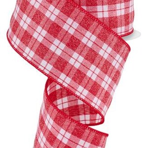 May include: Red and white plaid ribbon with a wired edge. The ribbon is 2.5 inches wide and has a subtle shimmer.