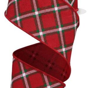 May include: Red, white, and green plaid ribbon with a diamond pattern. The ribbon is 2.5 inches wide.